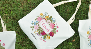 Personalised canvas tote bags as party favours.